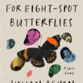 Cover of "No Country for Eight-Spot Butterflies" by Julian Aguon, featuring a dark butterfly with spots and colorful human face cut-outs in the background.