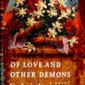 A red-haired figure peeks through white flowers with green leaves against a starry background on the cover of "Of Love and Other Demons" by Gabriel Garcia Marquez.